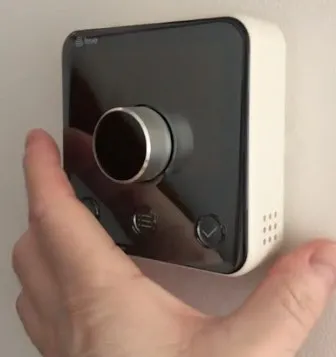 Central heating repairs 4 Smart heating thermostat on a wall